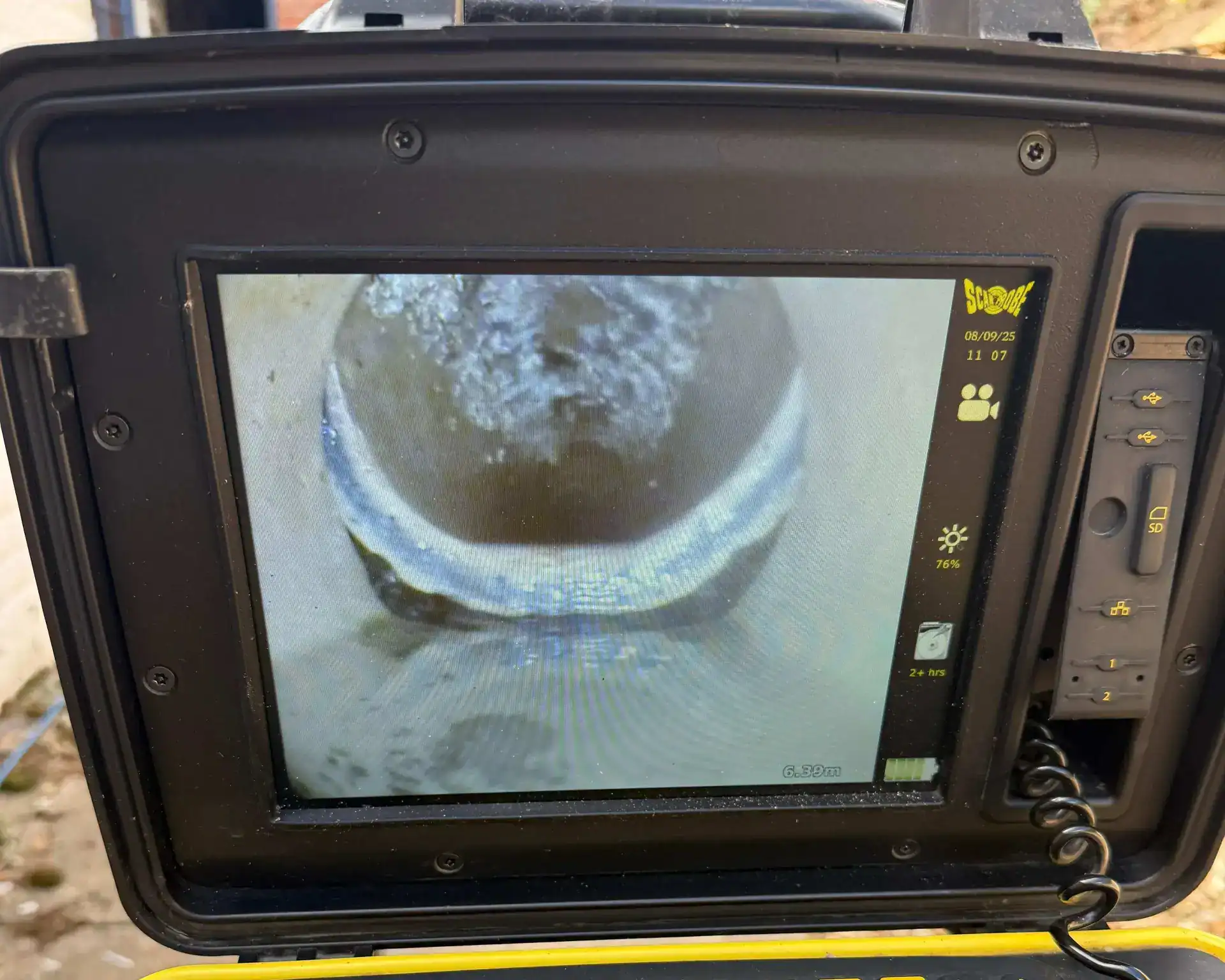 CCTV Drain Surveys in King's Lynn showing a live drain camera inspection on a specialist monitor to check underground pipework.