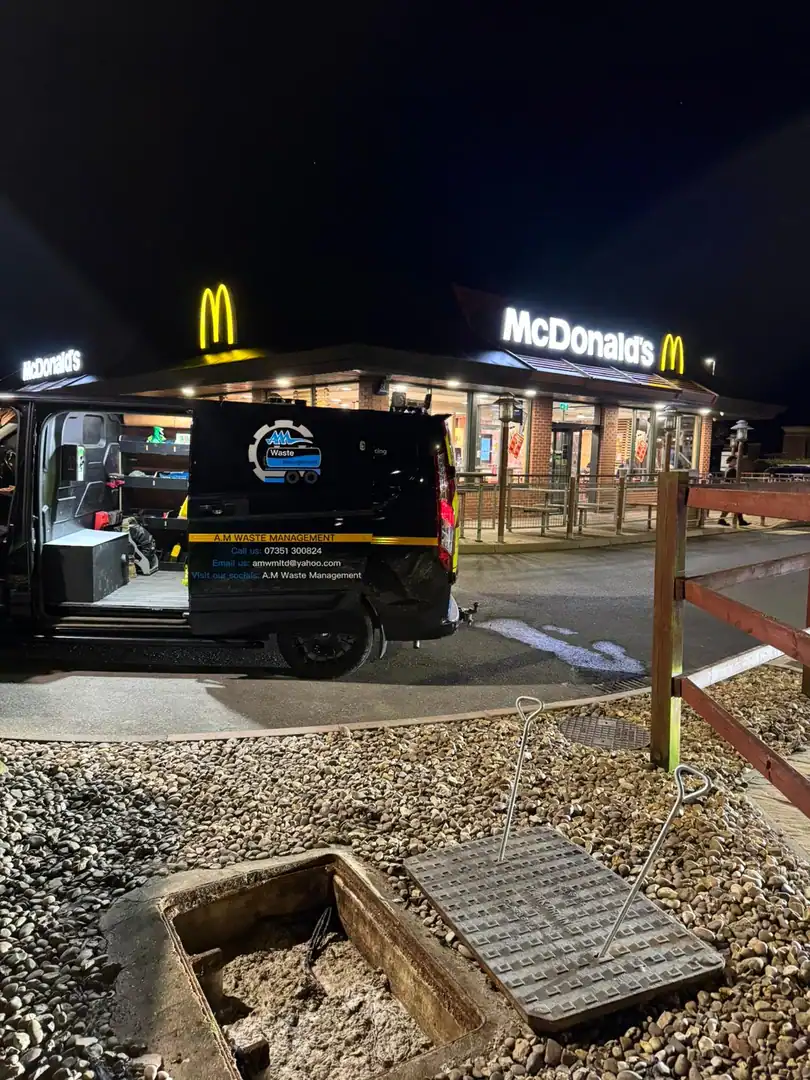 Emergency Drain Unblocking King's Lynn by AM Waste Management at a commercial premises during a night-time callout to investigate and clear a blocked drain.