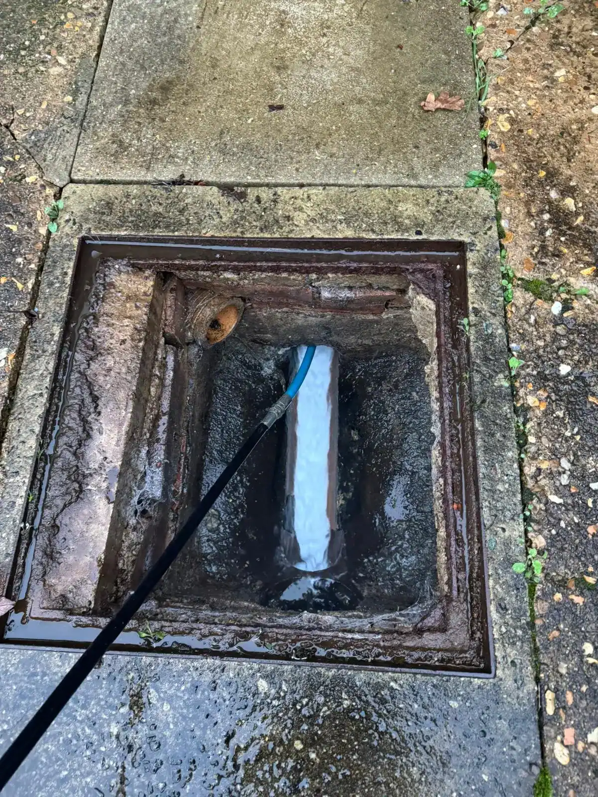 High-pressure jetting during emergency drain unblocking in North Runcton.