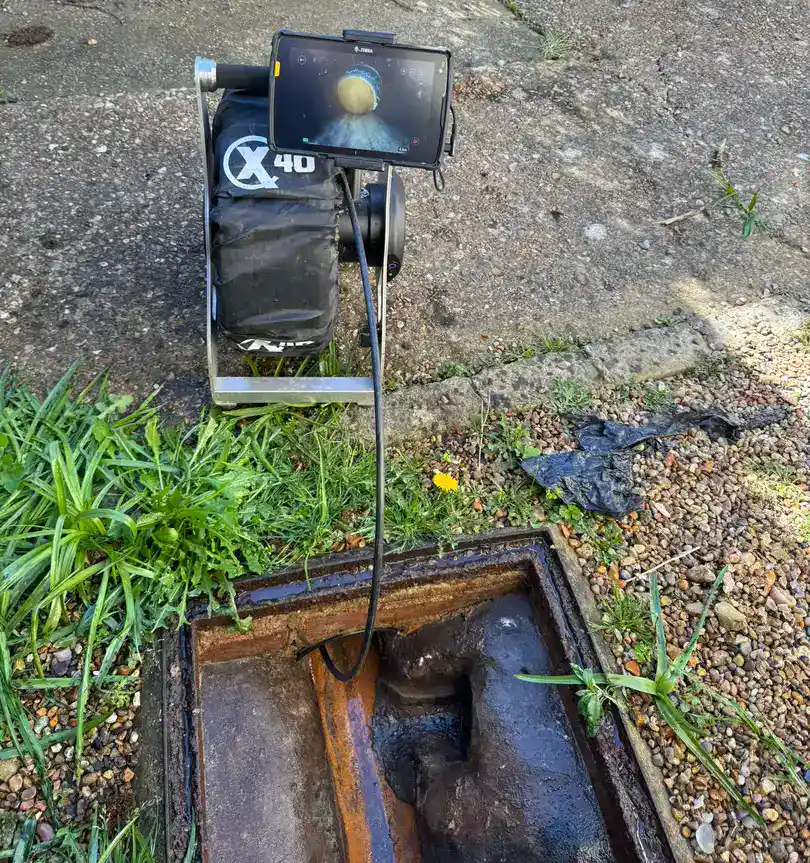 CCTV Drain Surveys in King's Lynn using specialist camera equipment and a monitor to inspect underground drainage pipework.