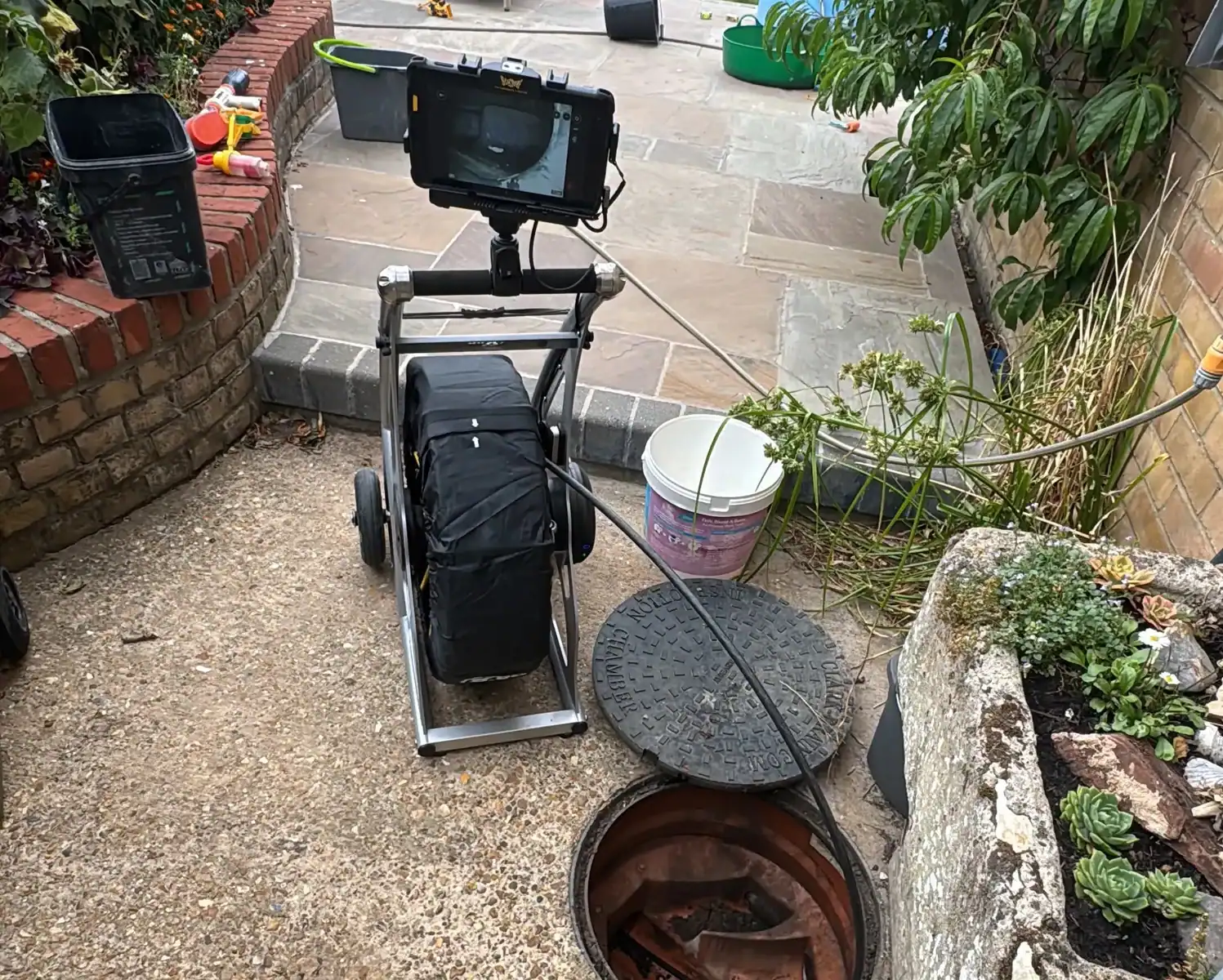CCTV Drain Surveys in King's Lynn with specialist camera equipment inspecting underground drainage pipework at a residential property.