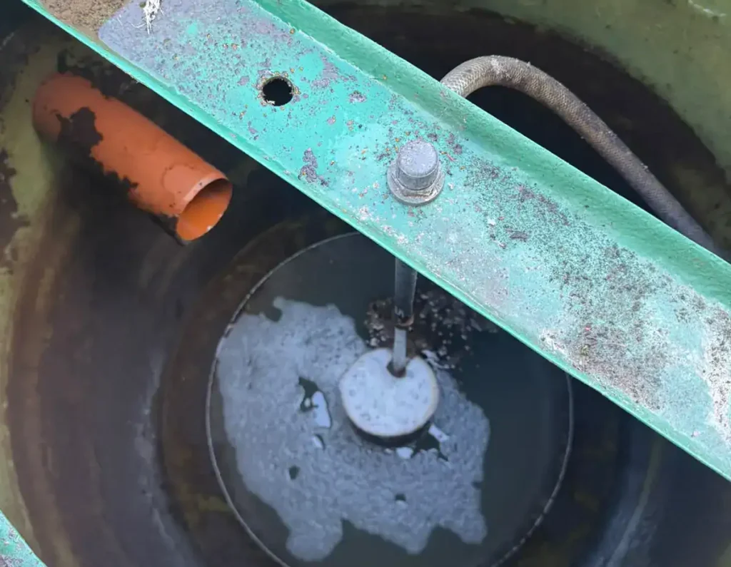 Sewage Treatment King's Lynn inspection showing the primary chamber of a sewage treatment plant during routine servicing by AM Waste Management.